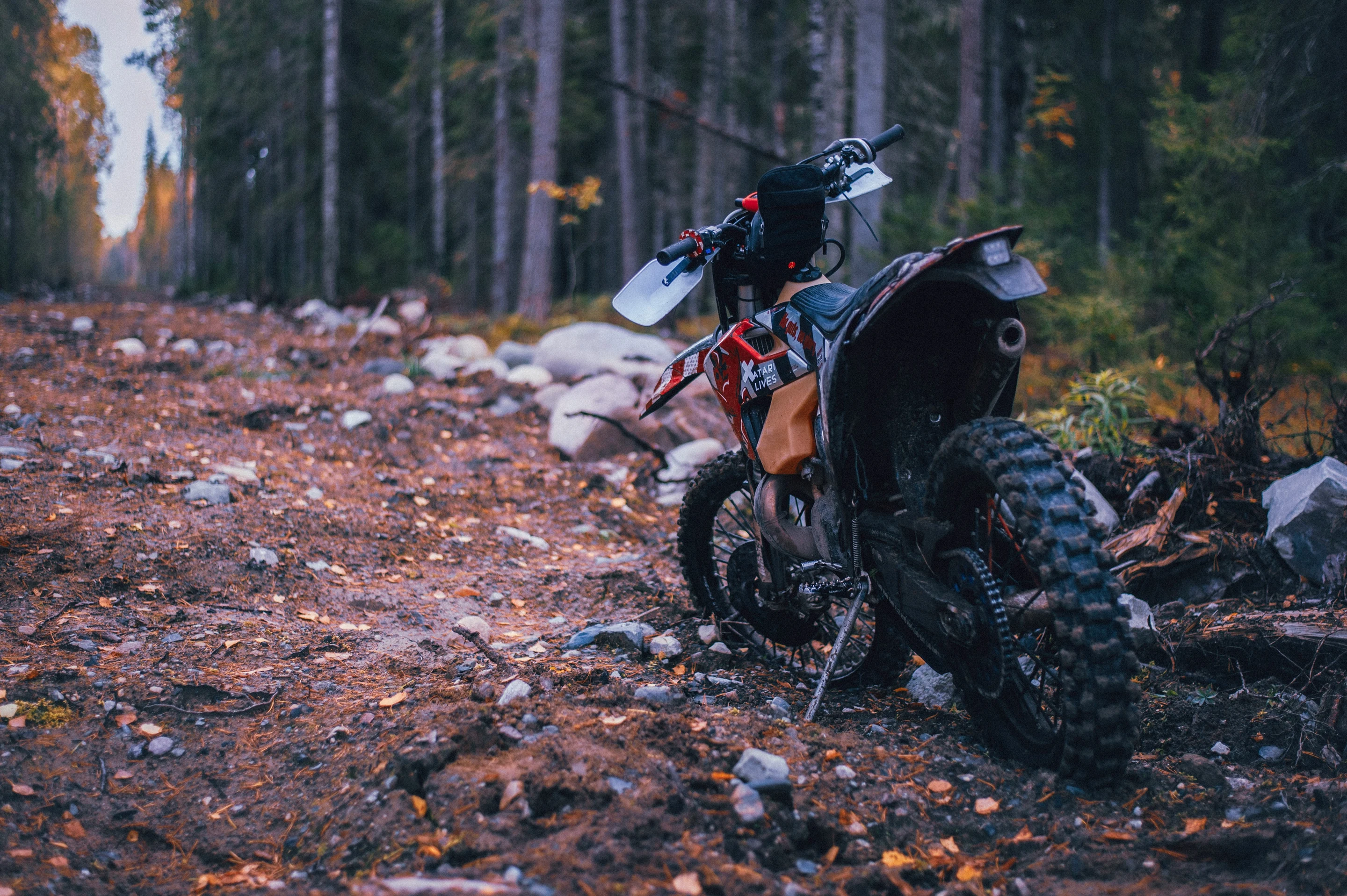 Offroad motorcycle rider on a dirt trail in Japan